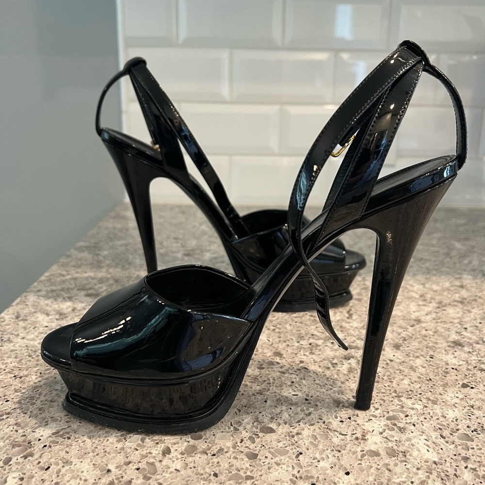 YSL Tribute Platform Sandals in Black Patent Leather